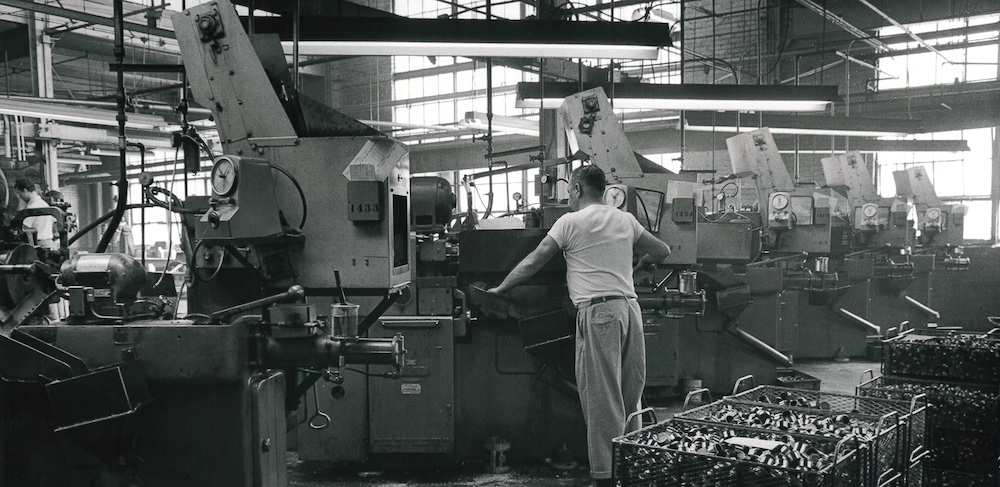 Machine operator on factory floor